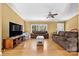 Spacious living room featuring hardwood floors and lots of natural light at 7053 Quailwood Dr, Stanley, NC 28164