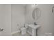 Small powder room with pedestal sink and toilet at 107 Dublin Ct, Statesville, NC 28677