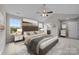 Large main bedroom with a tray ceiling and en-suite bathroom at 107 Dublin Ct, Statesville, NC 28677