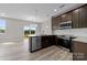 Open concept kitchen with island and deck access at 107 Dublin Ct, Statesville, NC 28677