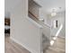 Bright entryway with staircase and view of kitchen at 107 Dublin Ct, Statesville, NC 28677