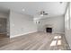 Spacious living room with fireplace and hardwood floors at 107 Dublin Ct, Statesville, NC 28677