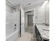 Bathroom with bathtub, double vanity and access to bedroom at 107 Dublin Ct, Statesville, NC 28677
