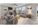 Living room features fireplace and access to deck at 107 Dublin Ct, Statesville, NC 28677