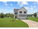 Two-story house with gray siding and lawn at 107 Dublin Ct, Statesville, NC 28677