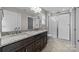Bathroom boasts a double vanity and a large walk-in shower at 107 Dublin Ct, Statesville, NC 28677