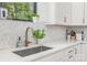 Modern kitchen sink and faucet with white cabinets at 1498 Robinwood Rd, Gastonia, NC 28054