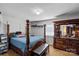 Spacious bedroom with a large bed and dresser at 2110 E Greenbriar Rd, Statesville, NC 28625