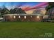 Brick house with solar panels and large backyard at 2110 E Greenbriar Rd, Statesville, NC 28625