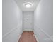 Clean and bright hallway with neutral walls at 2110 E Greenbriar Rd, Statesville, NC 28625