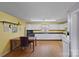Kitchen with white cabinets, wood flooring and table at 2110 E Greenbriar Rd, Statesville, NC 28625