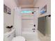 Clean bathroom featuring a shower/tub combo and window at 4364 Hager Mountain Ln, Iron Station, NC 28080