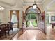 Grand entryway with double doors opens to a scenic walkway at 4364 Hager Mountain Ln, Iron Station, NC 28080