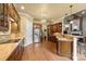 Gourmet kitchen with granite countertops and custom wooden cabinetry at 4364 Hager Mountain Ln, Iron Station, NC 28080