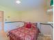 Charming bedroom with full-size bed and dresser at 1405 Northcrest Dr, Albemarle, NC 28001