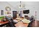 Relaxing living room with a fireplace and comfortable seating at 8018 Maxwelton Dr, Huntersville, NC 28078