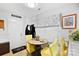 Bright dining area with yellow chairs and wood table at 8018 Maxwelton Dr, Huntersville, NC 28078