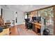 Home office with desk, chair, and access to the backyard at 8018 Maxwelton Dr, Huntersville, NC 28078