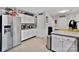 Modern kitchen with white cabinets and stainless steel appliances at 8018 Maxwelton Dr, Huntersville, NC 28078