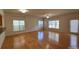 Spacious living room with hardwood floors and lots of natural light at 13706 Morehouse St, Huntersville, NC 28078