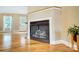 Gas fireplace with a white mantel in the living room at 2497 Carriage Ln, Lincolnton, NC 28092