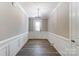 Bright entryway with wood floors and wainscoting at 3617 Marchers Trace Dr, Mint Hill, NC 28227