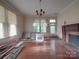 Dining room with hardwood floors, fireplace and stove at 222 Leak Ave, Wadesboro, NC 28170