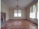 Living room with hardwood floors and fireplace at 222 Leak Ave, Wadesboro, NC 28170