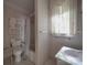 Full bathroom with toilet, shower, and sink at 222 Leak Ave, Wadesboro, NC 28170