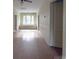 Long hallway with hardwood floors and built-in window seat at 222 Leak Ave, Wadesboro, NC 28170