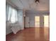 Charming bedroom with hardwood floors and built-in sink at 222 Leak Ave, Wadesboro, NC 28170