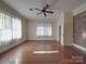 Spacious bedroom with hardwood floors and ample natural light at 222 Leak Ave, Wadesboro, NC 28170