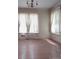 Large living room with hardwood floors and natural light at 222 Leak Ave, Wadesboro, NC 28170