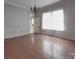 Dining room with hardwood floors and wainscoting at 222 Leak Ave, Wadesboro, NC 28170