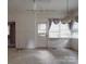 Simple breakfast room with exposed brick wall at 222 Leak Ave, Wadesboro, NC 28170