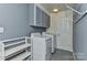 Laundry room with washer, dryer, and storage at 13901 Phillips Rd, Matthews, NC 28105