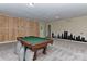 Game room with pool table and city skyline wall art at 13901 Phillips Rd, Matthews, NC 28105