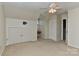 Bedroom with ceiling fan and built-in closet at 13901 Phillips Rd, Matthews, NC 28105