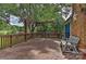 Deck with wooden bench and pergola structure at 13901 Phillips Rd, Matthews, NC 28105