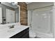 Bathroom with a tub, shower, and updated vanity at 13901 Phillips Rd, Matthews, NC 28105