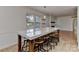 Eat-in kitchen with large island and pendant lighting at 13901 Phillips Rd, Matthews, NC 28105