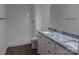 Bathroom boasts a shower, granite vanity, and vinyl flooring at 3910 Jenkins Rd, Clover, SC 29710