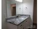Bathroom with granite countertop and double vanity at 3910 Jenkins Rd, Clover, SC 29710