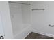 Clean bathroom with tub, shower rod, and vinyl flooring at 3910 Jenkins Rd, Clover, SC 29710