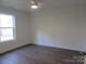 Bright bedroom with large window and vinyl flooring at 3910 Jenkins Rd, Clover, SC 29710