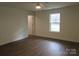 Well-lit bedroom with ceiling fan and wood-look flooring at 3910 Jenkins Rd, Clover, SC 29710