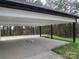 Covered carport offering parking and wooded views at 3910 Jenkins Rd, Clover, SC 29710