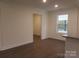 Simple dining room with hardwood floors and access to other rooms at 3910 Jenkins Rd, Clover, SC 29710