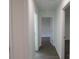 Light and airy hallway with wood-look flooring at 3910 Jenkins Rd, Clover, SC 29710