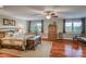 Bright bedroom with hardwood floors and a ceiling fan at 34 Sandbar Dr, Taylorsville, NC 28681